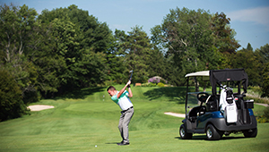 a golfer playing on the golf course 